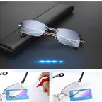 Rimless eyeglasses on a black notebook with a light test card demo
